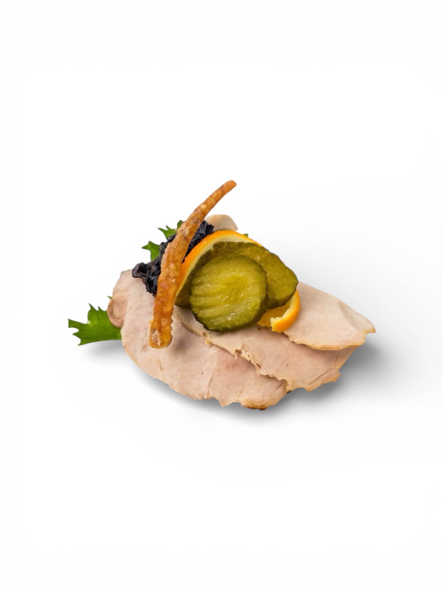 Flæskesteg, rødkål, syltede agurk & appelsin.